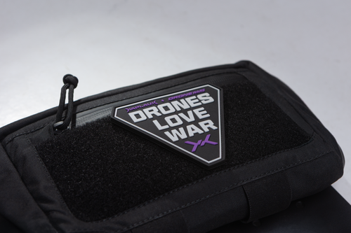Black pouch with 'Drones Love War' patch sick to velcro